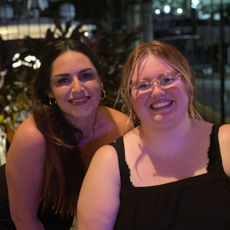 Two women smiling at the camera